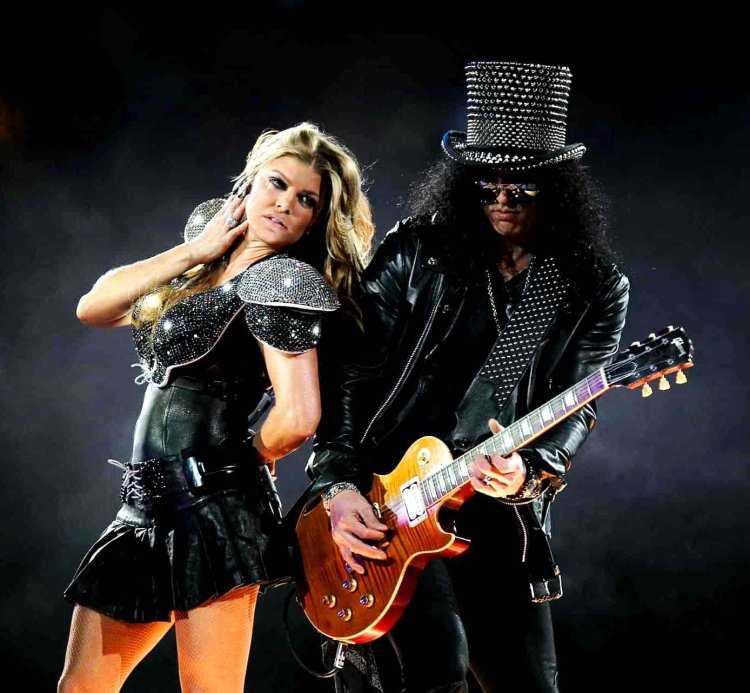 Ферги и рок музыкант в шляпе