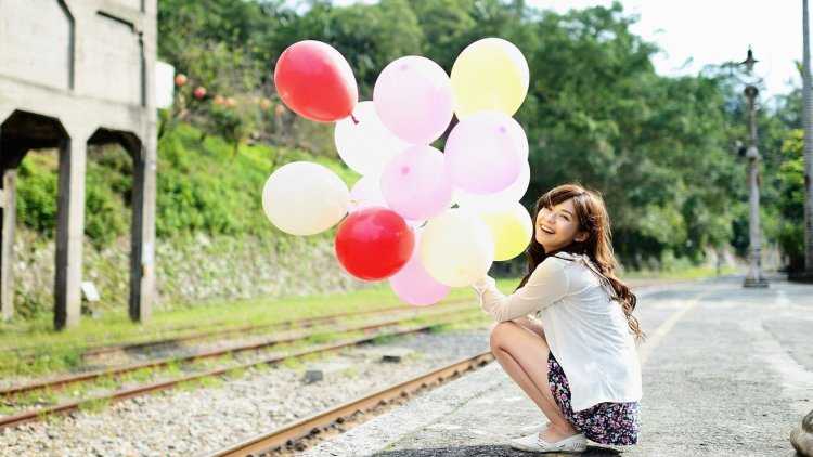 Женщина с воздушными шарами