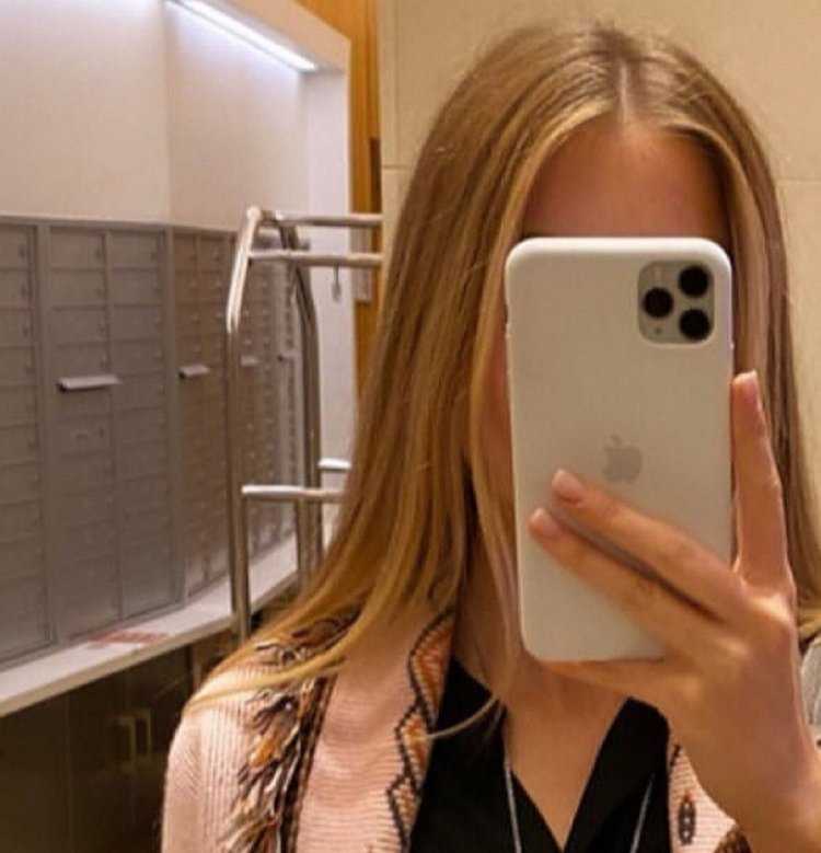 Девушка с айфоном 13