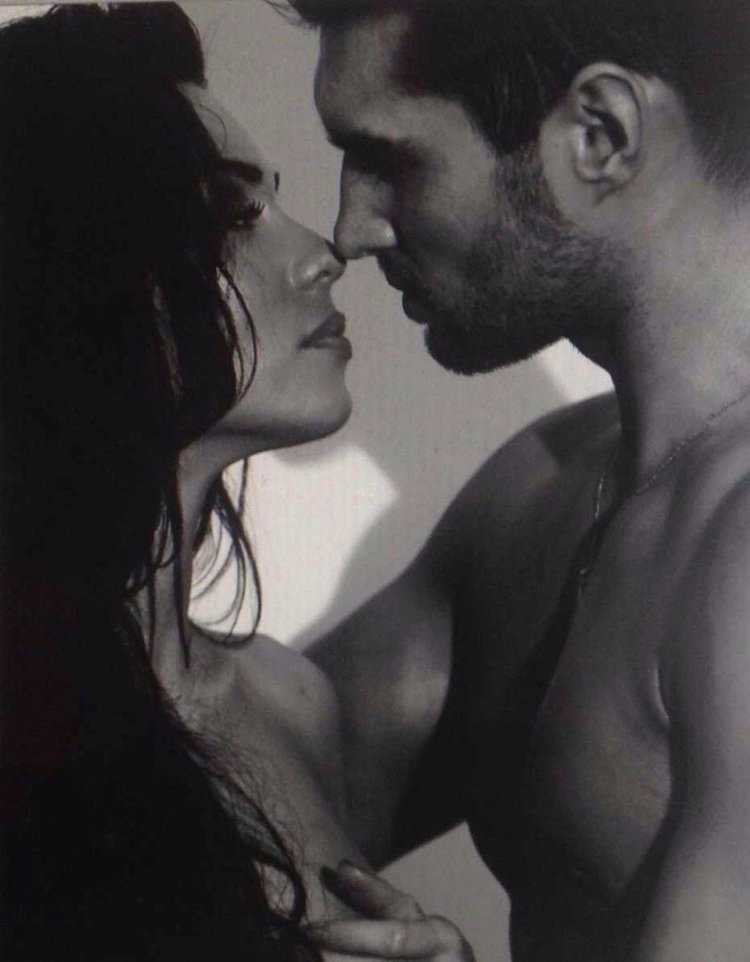 Мужчина с бородой и девушка брюнетка