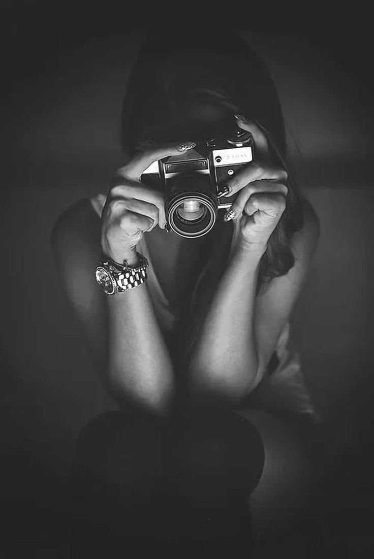 Девушка с фотоаппаратом