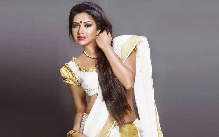 Амала Кхан индийский