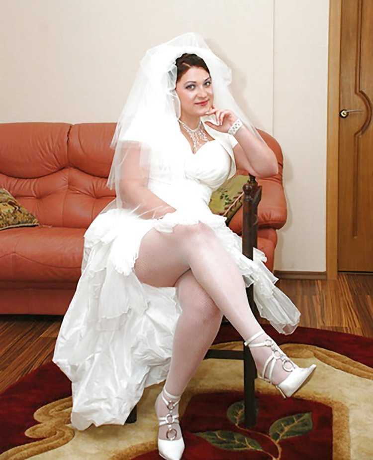 Жена в свадебном платье