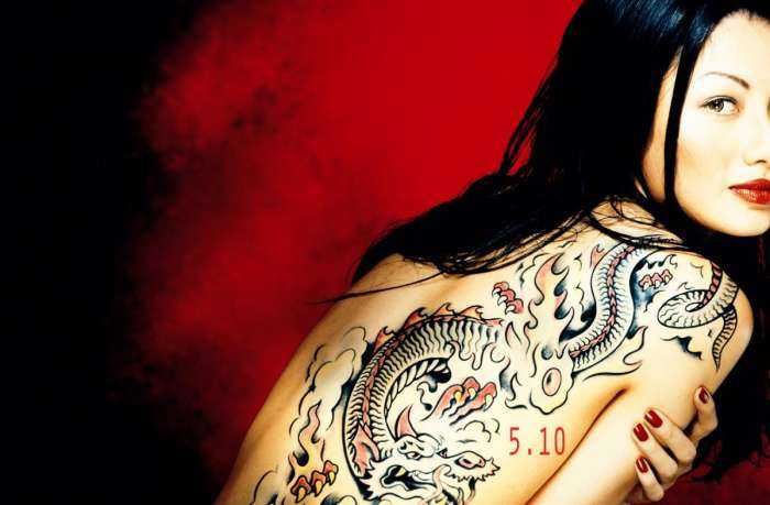 Тату на спинах девушек на фото