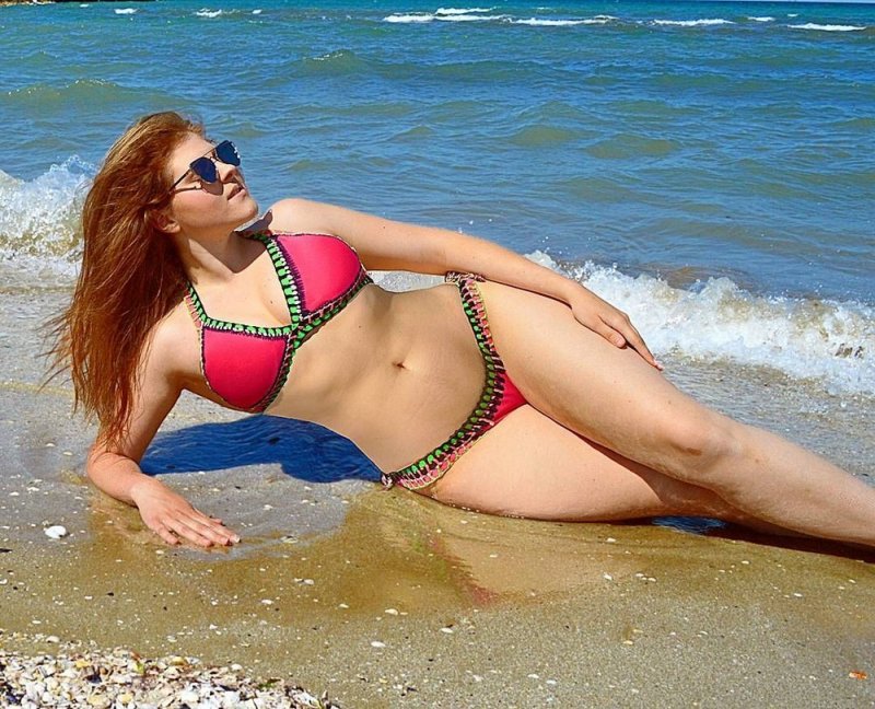 Рыжеволосая девушка, откровенные фото